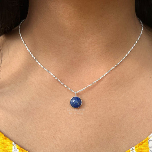10mm blue Lapis Lazuli pendant placed in a 18 inches chain with fine polish. Handcrafted jewellery that is a unique spiritual gift.